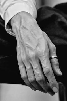 black and white photograph of a man's hands