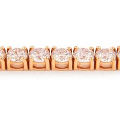 Exquisite and timeless diamonds tennis bracelet, by Alexander Beverly Hills. 44 round brilliant diamonds, 9.92 carats total. Approximately F/G color and VS2/SI1 clarity. Four prong set in 14k rose gold, 11.98 grams, 7 inches.  Accommodated with an up-to-date digital appraisal by a GIA G.G. once purchased, upon request. Please contact us with any questions. Rose Gold Diamond Tennis Bracelet Brilliant Cut, Rose Gold Diamond Tennis Bracelet With Prong Setting, Rose Gold Diamond Tennis Bracelet With Round Cut, Rose Gold Diamond Round Cut Tennis Bracelet, Rose Gold Round Cut Diamond Tennis Bracelet, Rose Gold Tennis Bracelet With Diamond Accents, Rose Gold Diamond Tennis Bracelet, Rose Gold Tennis Bracelet With Vvs Clarity, Fine Jewelry Rose Gold Tennis Bracelet With Prong Setting