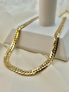 18k Gold Choker Curb Link necklace,13.19 gr , 18 " inches, 5.5 mm. Priced to sell! Compare our prices to other similar sellers! Arrives in a GIFT BOX and includes FREE SHIPPING within the USA and Canada. International shipping is available at the most economical rates on ETSY. I HAVE BEEN IN THE JEWELRY BUSINESS ALL MY LIFE. I am a second -generation family member making gold and jewelry. Please feel free to ask me any questions - Always happy to help! Luxury 22k Gold Chain Necklace For Gift, Traditional 22k Gold Luxury Chain Necklace, Gold Cuban Link Necklace Gift, Classic Gold Herringbone Necklace As Gift, Classic Gold Herringbone Necklace For Gift, Classic Gold Herringbone Necklace Gift, Gold Tarnish-resistant Herringbone Necklace As Gift, Gold Cuban Link Necklace Hallmarked, Gold Herringbone Necklace With Curb Chain