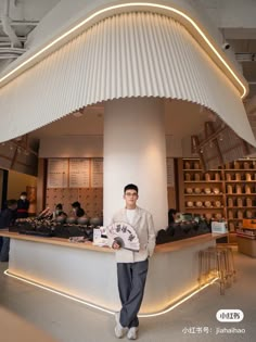 a man standing in front of a counter