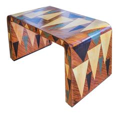 a wooden table with geometric designs on it