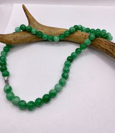 Vintage green jade choker necklace   silver over a bronze casting  16 inches long  Thank you for supporting a small veteran owned business. All jewelry is shipped free within the US in a stylish gift box Jade Beaded Single Strand Necklace Gift, Jade Single Strand Beaded Necklace Gift, Single Strand Jade Beaded Necklaces As Gift, Gift Emerald Necklace Single Strand Jade, Green 8mm Beads Necklace For Gift, Green Necklaces With 8mm Beads For Gifts, Gift Polished Beads Emerald Necklace, Gift Polished Round Emerald Bead Necklace, Emerald Necklace With Polished Beads As A Gift