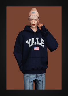 a young boy wearing a hoodie with the word yyle printed on it's chest