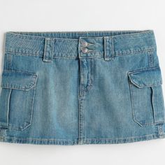 Fitted Skirt In Denim With Gentle Stretch. Low Waist, Zip Fly With Buttons, And Patch Side Pockets With Flap. Cargo Style Questions? Leave A Comment Below! Casual Light Wash Skort With Pockets, H&m Denim Blue Bottoms With Pockets, H&m Medium Wash Bottoms With Pockets, Casual Cotton Mini Skirt By H&m, Casual Fitted Mini Skirt By H&m, H&m Cotton Mini Skirt Casual, H&m Fitted Mini Skirt Casual Style, H&m Casual Mini Skirt With Pockets, H&m Casual Cotton Mini Skirt