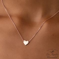 --LosAngelesMinimalist-- Heart Necklace, Necklace For Mom, Minimalist Necklace, Bridesmaid Necklace, Grandmother Necklace, Mothers Day Gifts, Gold Filled Necklace Material: High-Quality Solid 925 Sterling Silver Finish: Gold, Silver, Rose Gold The heart is finished with either 14K gold fill, rose gold fill, or 925. sterling silver. The chain comes with the same finish. On every chain, there is a 2-inch adjustable length available. 16'' chain is the most popular. We craft our jewelry with a passi Simple Charm Necklaces For Mother's Day, Minimalist Handmade Heart Pendant Necklace, Delicate Rose Gold Heart Necklace For Mother's Day, Personalized Minimalist Rose Gold Heart Necklace, Minimalist Heart Pendant Charm Necklace For Mom, Minimalist Heart Charm Necklaces For Wedding, Heart-shaped Rose Gold Necklace Gift For Mom, Minimalist Heart Necklace For Wedding, Minimalist Handmade Heart Necklace For Everyday