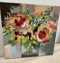 a painting of flowers in a vase on a table