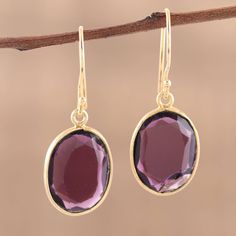 This striking pair of dangle earrings was designed by Vivek Nathany of India. A high-polished 22k gold plated sterling silver setting and hook is contrasted by rich, deep-purple, faceted amethyst gemstones for a color combination that conjures images of pure royalty, class and style. The gemstones total four carats. Shoulder Bags Pattern, Purple Earrings, Amethyst Color, Buy Gold, Amethyst Earrings, Jewelry Online Shopping, Gold Plated Earrings, Amethyst Gemstone, 22k Gold