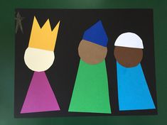 paper cut out of three people with crowns