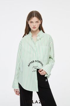 Details: Long sleeve cotton button down shirt in prep green stripes Spread collar Button front closure Oversized cuffs Curved hemline "After-School" graphic printed on front Oversized 'Boy' fit Materials & Care: 100% Cotton Hand wash | Dry clean Do not bleach Size & Fit: Model is 5'7", Bust 32, Waist 24, Hips 35, wearing a size S Item #: IL4BL03 Green Button-up Shirt With Striped Collar, Green Long Sleeve Shirt With Striped Collar, Green Tops With Striped Collar For Work, Green Top With Striped Collar For Work, Green Cotton Shirt With Striped Collar, Chic Business Casual, Denim Jean Dress, Boy Fits, Boys Fits