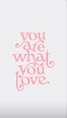 the words you are what you love written in pink ink on a white paper background