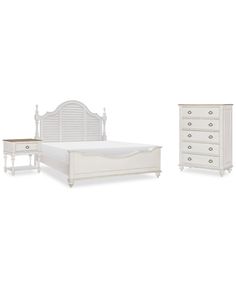 a white bed with two nightstands and a night stand