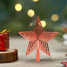 an ornament shaped like a star on a table