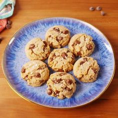 chocolate chip cookies on a blue and white plate