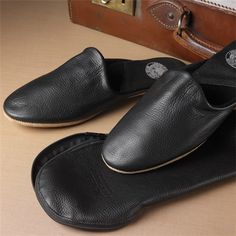 The Troy Travel Slippers in Calf Skin Luxury Leather Slippers With Round Toe, Black Leather Slippers With Removable Insole, Black Leather Slippers With Leather Lining, Black Leather Slippers With Leather Sole, Comfortable Black Slippers With Leather Sole, Classic Black Slippers With Rubber Sole, Luxury Slippers With Leather Sole And Calf Leather, Comfortable Black Leather Slippers, Classic Black Slippers