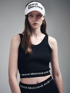 This is Mardi Mercredi Actif’s sleeveless knit top features a logo jacquard design, adding a stylish touch. It's a versatile piece suitable for both workouts and daily wear, making it a great innerwear option as well. Pair it with knit biker shorts for a more fashionable look.- Ideal for daily wear- Can be styled with various bottoms to create different looks- Its basic design allows for versatile styling that complements any outfit Casual Jacquard Knit Sleeveless Top, Sleeveless Knit Top, Jacquard Design, Basic Design, Sleeveless Knit, Knit Tank Top, Knit Tank, Knitted Tank Top, Cami Tanks