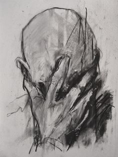 a black and white drawing of a man's head