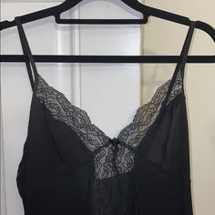 Beautiful Black Lace Nightie With Lace On The Sides As Well Never Worn Nwot Black Spaghetti Strap Top For Sleep, Black Cami Sleepwear With Lace Trim, Black Lace Trim Cami Sleepwear, Victoria's Secret Sleeveless Night Camisole, Black Lace Trim Sleep Top, Black Cami Sleepwear For Lounging, Black Cami Sleepwear For Loungewear, Black Lace Trim Sleepwear For Date Night, Victoria's Secret Sleepwear With Built-in Bra