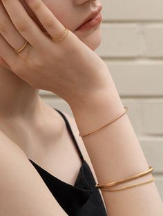 - Layered bracelet- Thin and simple bracelet- Bangle styleMeasurements- 1.95g Composition- Silver 925- Silver/Gold(18K plate)Designer- Imported- by MCCOII- Style#:300537747 Gold Bangle Design, Bangle Design, Layered Bracelet, Bangles Design, Gold Bangles Design, Simple Bracelets, Bangle Designs, Gold Bangle, Bracelet Bangle