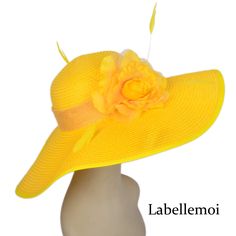 NEW DESIGN Materials: paper straw,silk flower,coq feathers Hat body is made of paper straw braid with trimming of coq feather & silk flower Brim width is 15cm,best choice for Derby,church,tea party and wedding Head size: 56.5cm(not adjustable),with elastic inside Color: yellow, it is very bright color which can always let you stand out from the crowd Ideal for wedding/party/races/church It is sent by epacket which takes 5-10 days to United Kingdom,10-25 working days to most of other countrie Elegant Yellow Straw Hat For The Beach, Elegant Yellow Straw Hat For Beach, Elegant Yellow Straw Hat For Summer, Elegant Yellow Summer Straw Hat, Yellow Summer Fascinator For Races, Yellow Summer Fascinator With Short Brim, Summer Beach Fascinator, Yellow Mini Hats For Summer Beach, Yellow Wide Brim Mini Hat For Beach