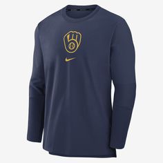 the nike baseball team's long - sleeve tee is shown in blue and yellow