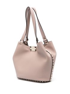 powder pink calf leather pebbled texture signature Rockstud detailing logo-engraved gold-tone hardware internal logo stamp clasp fastening/lobster claw fastening two flat shoulder straps main compartment internal patch pocket leather lining This piece comes complete with a protective dust bag. This item is in size UNI and the color is Pink Leather Tote Bag Women, Detailing Logo, Medium Sized Bags, Valentino Rockstud, Leather Cap, Powder Pink, Logo Stamp, Small Handbags, Handbag Backpack