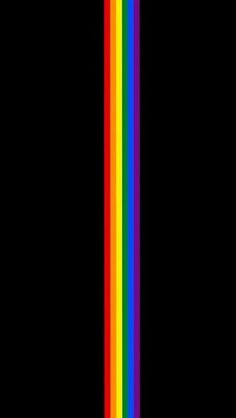 a rainbow colored line on a black background with space for the letter i to be