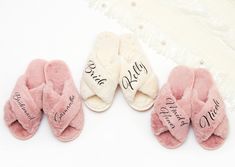 three pairs of slippers with personalized names on them and one pair of shoes