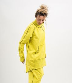 Grab a look from the archives with this Yellow asymmetrical sweatshirt women. In a yellow colour minimal design, this sweatshirt is made from a soft cotton blend to keep your feelin' comf' and chilled out. Coming in an overhead design, this Yellow asymmetrical sweatshirt women has one side front pocket, and a zipper with two sliders. Finished with thumb holes on the sleeves. This Cotton sweatshirt women plus size clothing is designed to flatter every body type and fit perfect. When we designed t Khaki Overalls, Asymmetrical Sweatshirt, Linen Top Women, Linen Crop Top, Yellow Colour, Sweatshirt Women, Linen Skirt, Women Plus Size, Asymmetrical Tops