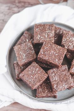 chocolate porter brownies on a plate with text overlay that reads dark chocolate porter brownies