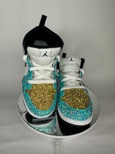 Step up your Jordans game with these fully blinged Jordan 1 mids. These shoes are a great addition for prom, a birthday, a wedding, a night on the town, or your  next event! These shoes can be customized to the colors of your choosing. Not looking for Jordan 1's? Message me with your shoe choice. I'd love to create the custom shoe of your dreams. *Disclaimer We are not associated with the brand, I only hand customize the shoes using rhinestones. Sneaker Ball Shoes, Rhinestone Sneakers, Bling Nike Shoes, Jordan 1 Mids, Custom Rhinestone, Ball Party, Jordan 1s, Sneakers Athletic, Prom Shoes