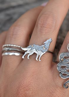 Moon & Star Wolf Ring details:-Solid .925 sterling silver-Bronze Gold Moon and Star-Wolf measures approx. 20mm x 17mm-Smooth ring band measures 1.2mm wide-Comfortable and easily stackable!-Available in US sizes 1-11 with half sizes. Connect with us on Instagram @a_wild_violet for sales and giveaways!**All items are in stock and ship within 2-5 business days from received payment (excluding Saturday/Sunday) from the US. If you are within the US please expect 3-7 business days for shipping transit Adjustable Silver Magical Style Rings, Adjustable Mystical Sterling Silver Rings, Magical Silver Open Ring Jewelry, Mystical Sterling Silver Rings, Mystical Sterling Silver Nickel-free Rings, Nickel Free Mystical Sterling Silver Ring, Mystical Nickel-free Sterling Silver Rings, Nickel-free Mystical Sterling Silver Rings, Silver Moon Shaped Symbolic Ring