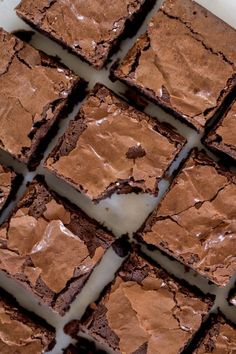 chocolate brownies cut into squares on top of each other