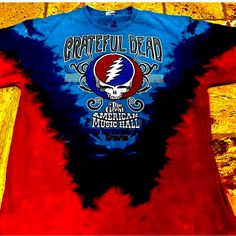 Excellent Condition Grateful Dead Tie-Dyed T-Shirt. Not That Many Left Around. Blue Crew Neck Shirt With Band Merch, Blue Pre-washed Tops For Spring, Spring Blue Pre-washed Tops, Spring Blue Pre-washed Top, Blue Short Sleeve Shirt For Festival, Blue Band Merch Shirt With Screen Print, Vintage Blue T-shirt For Fall, Blue Graphic Print T-shirt For Festivals, Blue Cotton T-shirt For Concert