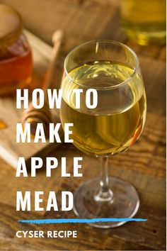 a close up of a wine glass on a table with text overlay reading how to make apple mead