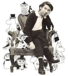 a black and white photo of a man sitting on a chair surrounded by cartoon characters