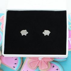 A cute pair of Pig shaped stainless steel stud earrings Each pair arrives in a striking white gift box with a contrasting silver logo. A free gift wrapping service is also available upon request. Silver Logo, Logo A, Gift Wrapping Services, White Gift Boxes, Simple Earrings, Free Gift Wrapping, Jewelry Earrings Studs, Free Gift, Free Gifts