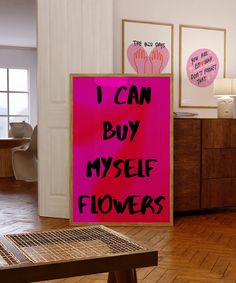 a pink sign that says i can buy myself flowers in black writing on it