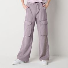 Live that cargo pants life with these from Arizona Jean Co.'s women's and junior's collection. They're made from a twill cotton-blend and feature a baggy-fit, a wide leg, a flat front, a high-rise, an elastic back, a drawstring-waist, and multiple pockets. Add sneakers and a t-shirt. Front Style: Flat FrontClosure Type: Drawstring, Button, Elastic BackFit: Baggy FitPockets: 2 Cargo Side Pockets, 2 Front Slip Pockets, 2 Back Slip PocketsRise: Mid RiseFiber Content: 52% Cotton, 48% Tencel LyocellF Spring Wide-leg Cargo Pants With Drawstring, Stretch Wide-leg Cargo Pants With Elastic Waistband, Utility Wide-leg Cargo Pants With Drawstring, Solid Color Wide-leg Cargo Pants With Elastic Waistband, Fitted Full-length Cargo Pants With Elastic Waistband, Women Cargo Pants, Cargo Pant, Baggy Fits, Drawstring Waist