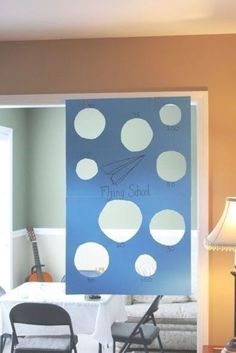 a blue door with white polka dots on it