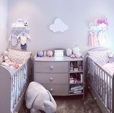 two baby cribs with stuffed animals in them and one has a teddy bear