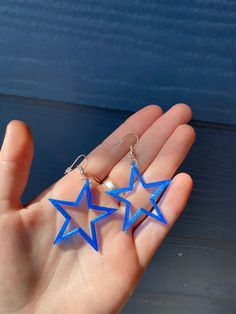 These cute translucent blue star earrings are made with 3D printed plastic materials, and are accompanied by silver plated earring hooks and loops with rubber earring stoppers. Blue Star Earrings, Scene Jewelry, Silly Clothes, Plastic Earrings, Blue Accessories, Funky Earrings, Blue Stars, Blue Jewelry, Earring Hooks