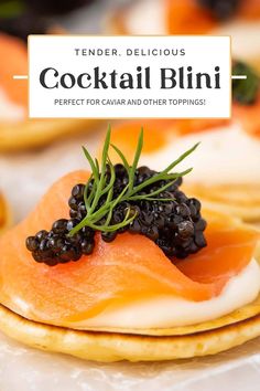 a close up of food on a plate with the words cocktail blinii above it