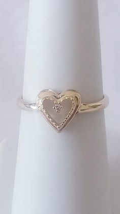 Heart Shaped Diamond Ring 10k Yellow Gold Size 6.25 Can be sized by any Competent jeweler near you sizes 5-9 Heart-shaped Hallmark Ring For Anniversary, Heart-shaped Anniversary Ring With Hallmark, Classic Heart Ring With Diamond Cut For Valentine's Day, Classic Heart-shaped Diamond Ring, Valentine's Day White Gold Diamond Ring, Classic Heart Shaped Diamond White Rings, Classic Diamond White Rings For Valentine's Day, 14k White Gold Heart Cut Heart Ring, White Gold 14k Promise Heart Ring