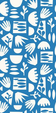 a blue and white pattern with hands, leaves, and other things on it's surface