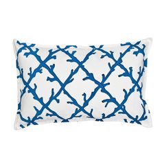 a blue and white pillow on a white background