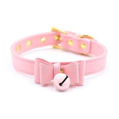 a pink collar with a bow on it