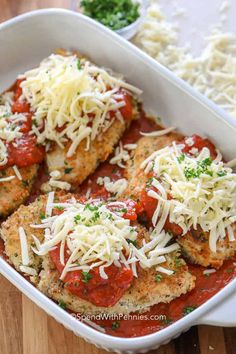 chicken parmesan in a casserole dish with cheese on top