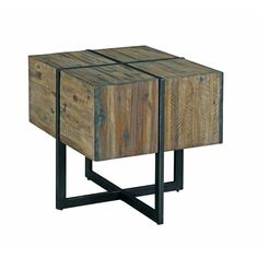 a wooden table with metal legs and drawers