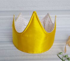 Beautiful adorable birthday crown for kids and adults. For party, birthday, carnival, gift... It is attached to the back of the head with Velcro and can be individually adjusted to a head circumference of approx. 40-56 cm. Height approx. 13.5 cm, length approx. 60 cm. The fabric crown is made of 100% cotton (inside of the crown), GOTS and OEKO-TEX certified and reinforced with an inner lining, soft and comfortable to wear. The outer side is 100% synthetic. CARE: We recommend gentle washing at te Royal Crown With Pinched Crown For Party, Princess Crown With Pinched Crown For Birthday, Princess Crown Party Supplies For Birthday, Princess Crown With Adjustable Tall Crown, Royal Teardrop Crown For Party, Princess Crown For Party With Pinched Style, Princess Crown With Structured Shape For Party, Princess Crown With Structured Design For Party, Princess Style Crown With Structured Shape For Party