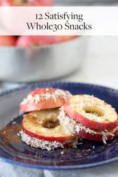 an apple and almond butter sandwich on a blue plate